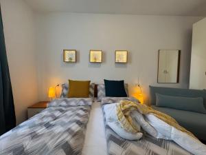 Ένα ή περισσότερα κρεβάτια σε δωμάτιο στο Il SOLE APARTMENT