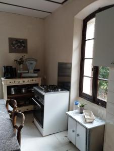 Kuchyň nebo kuchyňský kout v ubytování Pause détente