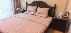 En eller flere senge i et værelse på Tidewhisper Deluxe Suite 1 -2 Bedrooms, 2 Bathrooms