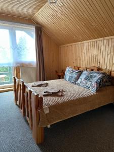 Ένα ή περισσότερα κρεβάτια σε δωμάτιο στο Family Home