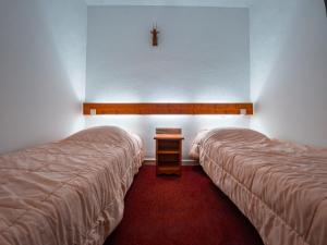 Ένα ή περισσότερα κρεβάτια σε δωμάτιο στο Appartement 3 pièces 6 pers, Résidence calme proche télécabine, animaux admis, Arc 1800 - FR-1-411-34 +15 φωτογραφίες