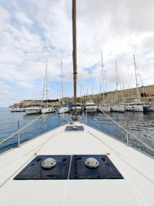 a view from the bow of a boat in a marina at Unique Yacht Stay Near Historic Valletta in Tal-Pietà