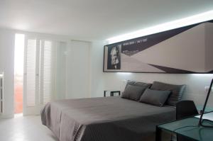 Postel nebo postele na pokoji v ubytování Muta House