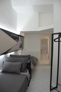 Postel nebo postele na pokoji v ubytování Muta House