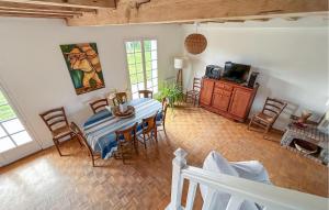 a dining room with a table and chairs at Belle Maison Landaise in Mimizan +24 photos