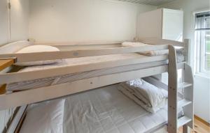 Postel nebo postele na pokoji v ubytování Gorgeous Home In Byxelkrok With Wifi