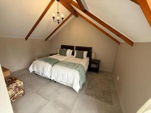 Postel nebo postele na pokoji v ubytování Pure Clarens