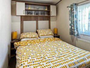 Postel nebo postele na pokoji v ubytování Flamingoland + 9 fotografií