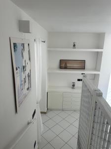 Η κουζίνα ή μικρή κουζίνα στο Nonno Gian +6 φωτογραφίες