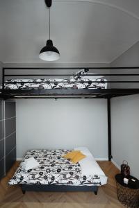 a bedroom with a bunk bed in a room at Mole Turin Suite in Turin