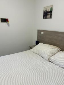 Llit o llits en una habitació de Maison Valentini