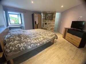 Postel nebo postele na pokoji v ubytování Gîte de Vareilles