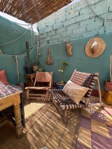 Χώρος καθιστικού στο Chambre privée de charme au cœur de la ville