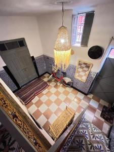 Ένα ή περισσότερα κρεβάτια σε δωμάτιο στο Chambre privée de charme au cœur de la ville