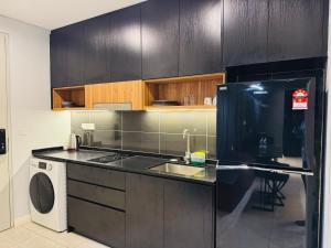 Η κουζίνα ή μικρή κουζίνα στο Axon Residence suites Bukit Bintang