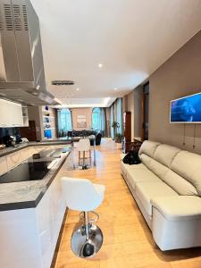 Kuchyň nebo kuchyňský kout v ubytování Magnifico Roero Relax Tre Camere