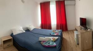 En eller flere senge i et værelse på Casa De Zambini