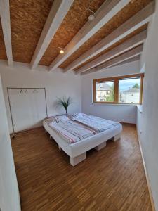 Postel nebo postele na pokoji v ubytování Höhenblick Klosterneuburg