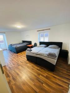 Ένα ή περισσότερα κρεβάτια σε δωμάτιο στο Wohnung für bis zu 6 Personen in 84375 Kirchdorf