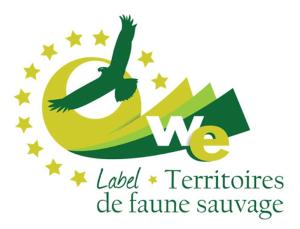 a logo with a bird flying in the sky at L'envol des papillons in Lafarre