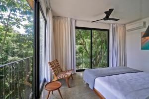 Postel nebo postele na pokoji v ubytování Villa Alba Malpais 4ensuite rooms ocean view by Sea N Sun