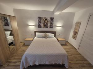 Katil atau katil-katil dalam bilik di Tre Cannelle