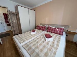 Ένα ή περισσότερα κρεβάτια σε δωμάτιο στο ChiemseeStrand