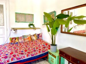 Ένα ή περισσότερα κρεβάτια σε δωμάτιο στο Muzeum Butique Studio