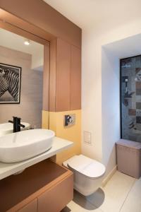 Koupelna v ubytování Sia Charm