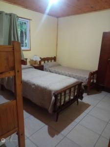 Ένα ή περισσότερα κρεβάτια σε δωμάτιο στο La Casita