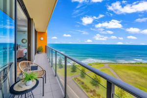 a balcony with a view of the ocean at 901 - Perfect Penthouse - With Free Parking in Newcastle