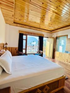 Postel nebo postele na pokoji v ubytování Shalom Hillcrest Inn