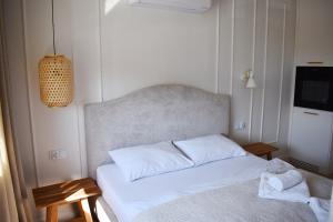 Postel nebo postele na pokoji v ubytování Wino&Grono Nałęczów