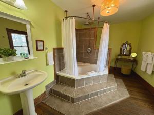 a bathroom with a shower and a sink at Inn 31 in Kingsville +25 photos