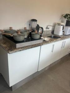 Η κουζίνα ή μικρή κουζίνα στο Residencial da Ju - Apt 03