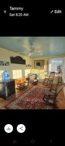 a living room with chairs and a rug at Langdon Hill House Felty Room in Gettysburg