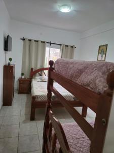 Giường trong phòng chung tại La Margara Salta