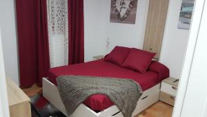 En eller flere senge i et værelse på Casa VIAT + 10 billeder