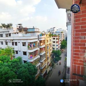 a view of a city street with buildings at Azul BD in Bāiljuri