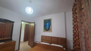 Postel nebo postele na pokoji v ubytování Golem Green Retreat