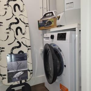 Kuchyň nebo kuchyňský kout v ubytování Riverside Apartment + 14 fotografií