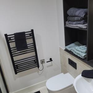 Koupelna v ubytování Riverside Apartment