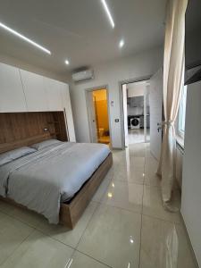 Ένα ή περισσότερα κρεβάτια σε δωμάτιο στο Roxy's Home in Rome