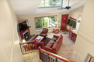 an overhead view of a living room with a fireplace at Long Beach Lodge Resort in Tofino