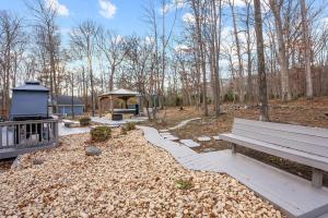 a park with a bench and a gazebo at Blue Mountain Song- Massanutten Home with Hot tub! in Hopkins Spring