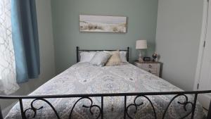 Postel nebo postele na pokoji v ubytování Fort Stewart Guest Suite