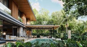 a house with a swimming pool in a garden at Casa Nunc - New Home - 3 Minute Walk to the Beach in Nosara