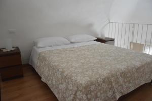 Postel nebo postele na pokoji v ubytování La Casa di Abramo