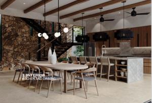 a kitchen with a table and chairs in a room at Casa Nunc - New Home - 3 Minute Walk to the Beach in Nosara +3 photos