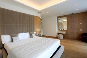 Ein Bett oder Betten in einem Zimmer der Unterkunft Cosmo Apartments Platja d'Aro